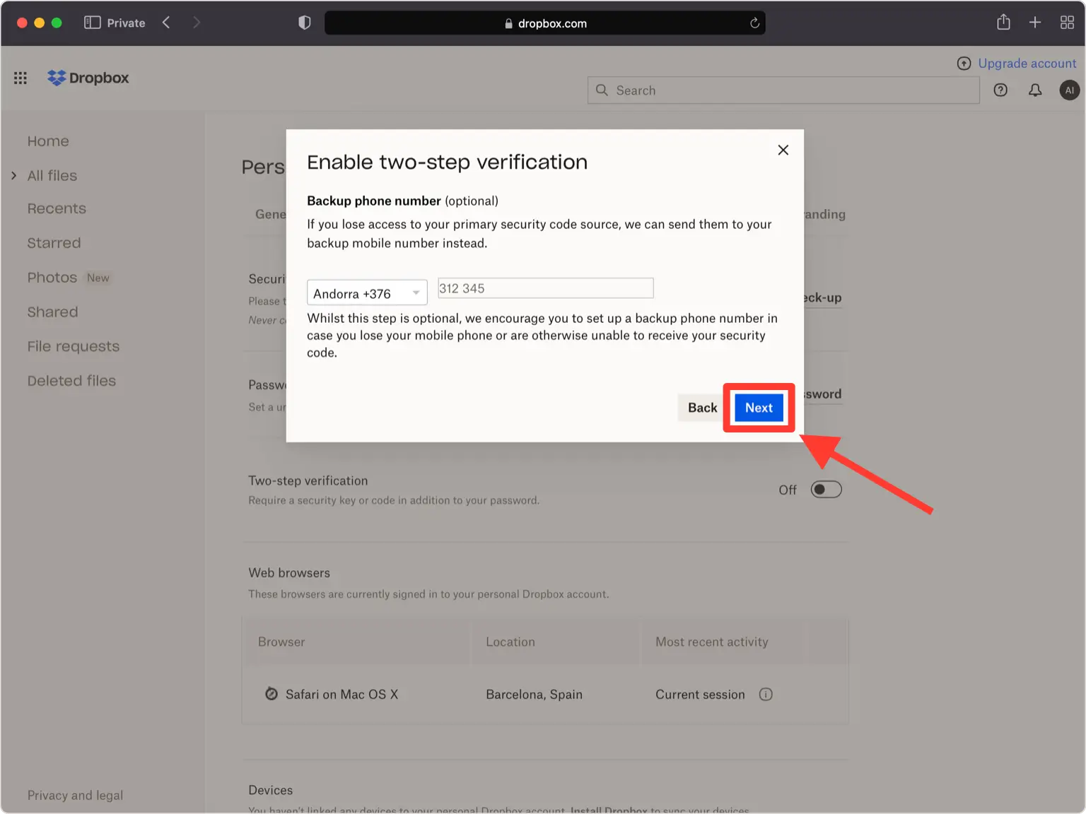 Dropbox two-step verification setup screen asking for an optional backup phone number. A dropdown menu is set to ‘Andorra +376,’ and a partial phone number ‘312 345’ is entered. An arrow points to the ‘Next’ button at the bottom to proceed with the setup.